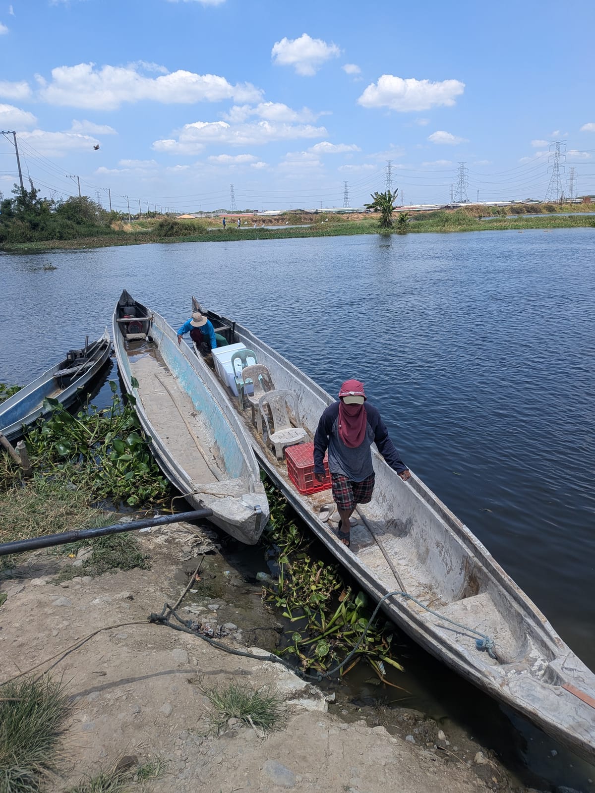 Fish transport boats on an aquaculture lake